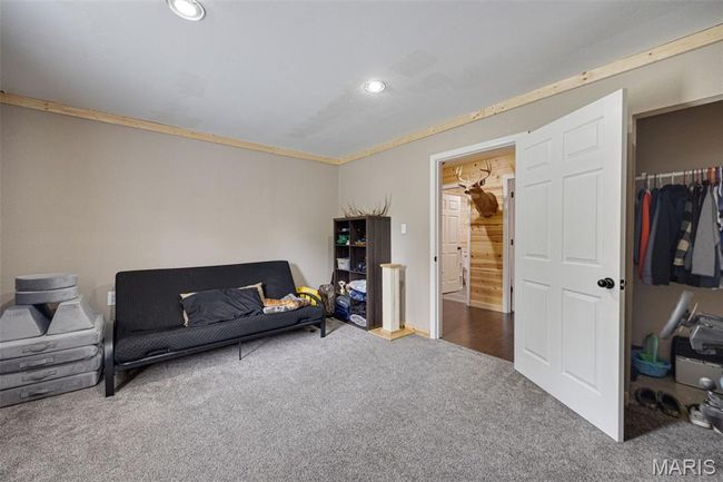 Sitting room featuring carpet floors and recessed lighting | Image 15