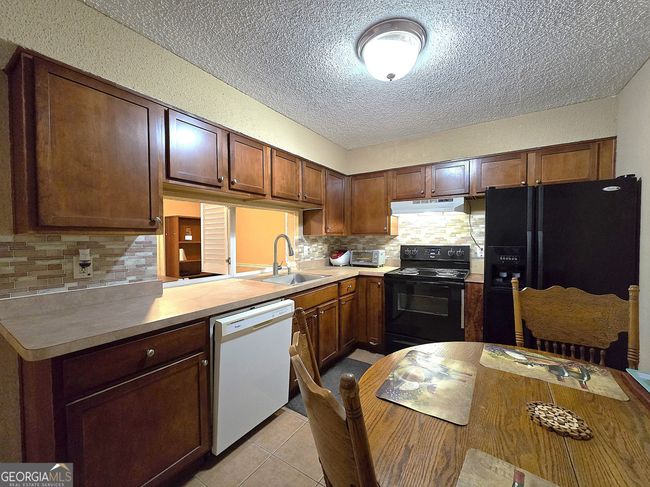 315 Seasons Pkwy, Condo with 2 bedrooms, 2 bathrooms and null parking in Norcross GA | Image 12