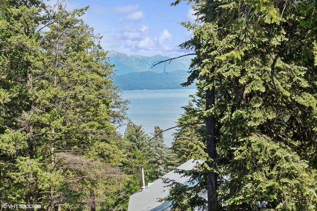 Water view featuring a mountain backdrop | Image 54