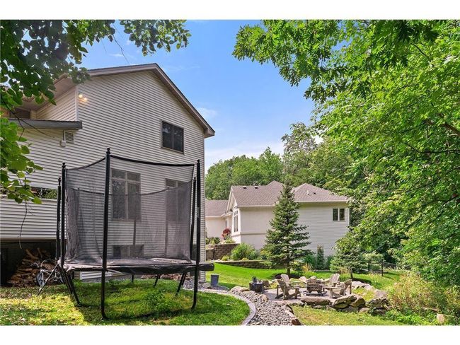 11260 Hidden Oaks Ct N, House other with 5 bedrooms, 4 bathrooms and null parking in Champlin MN | Image 43