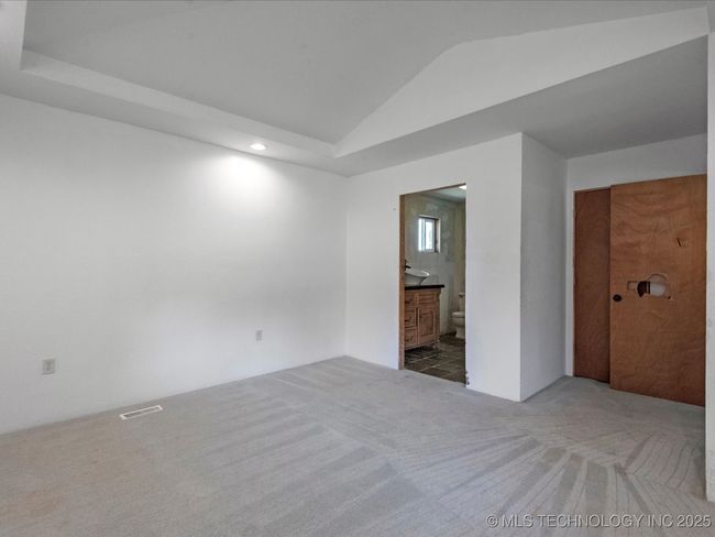 carpeted main bedroom | Image 12