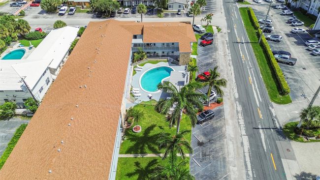 New Roof 2022, 50 Year work completed September 2024, Entire Exterior, Pool Area and Balconies Painted, New Railings installed etc. No Other Assessments known or planned! You Will Love this Boutique Community! | Image 55