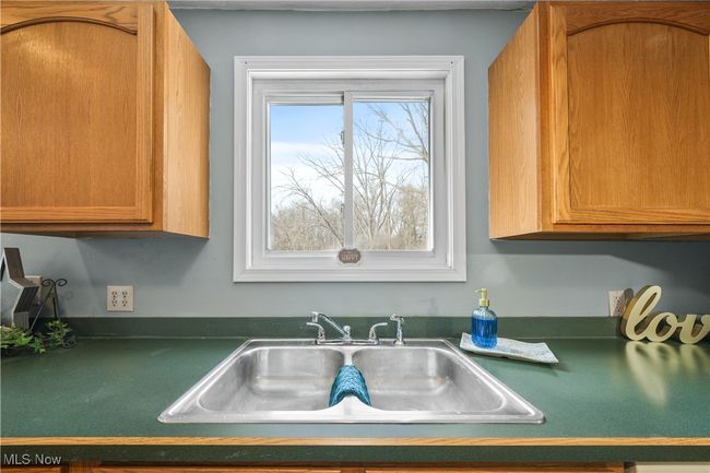 Kitchen featuring sink | Image 8