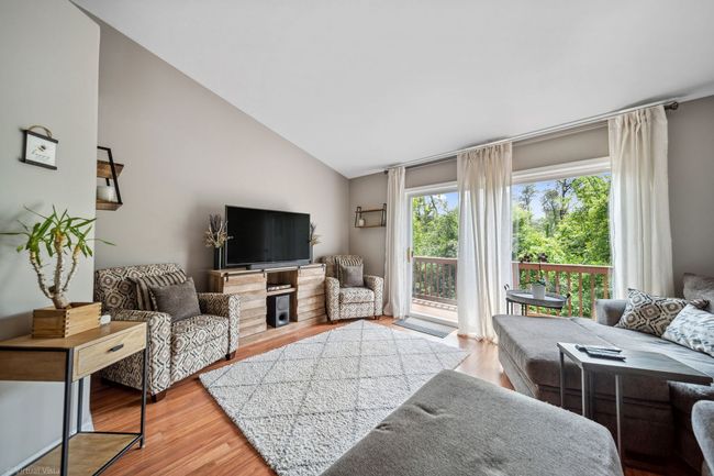 Patio doors to deck. | Image 7