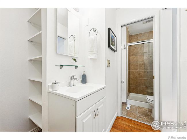 this is the ensuite bath for one of the main floor bedrooms | Image 13