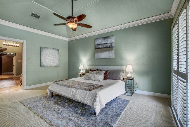 Primary Bedroom with sliders to the back deck | Image 17