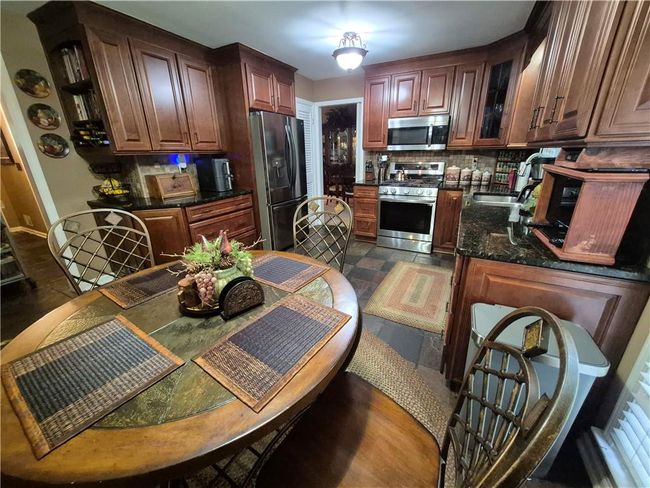 4094 Carlisle Pl, House other with 4 bedrooms, 3 bathrooms and 5 parking in Stone Mountain GA | Image 15