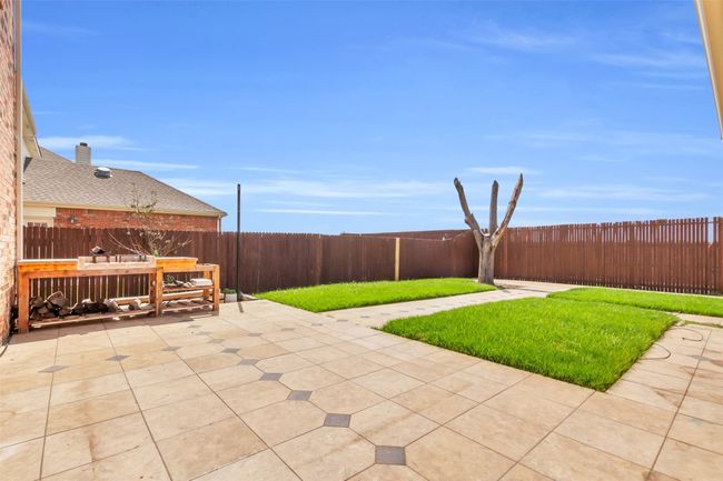 Fenced backyard. | Image 25