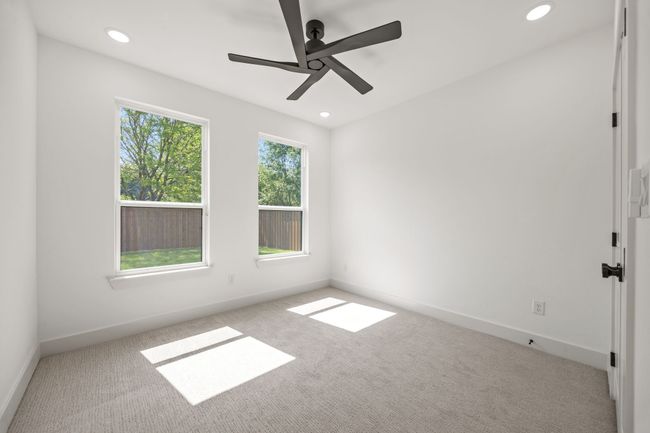 Carpeted empty room with baseboards, recessed lighting, and ceiling fan | Image 22