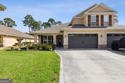 341 Laurel Landing Boulevard, Townhouse with 4 bedrooms, 3 bathrooms and null parking in Kingsland GA | Image 1