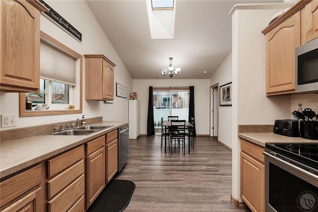 kitchen with view of dining | Image 9