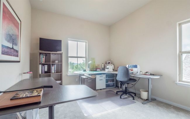 Bedroom #3 upstairs which is currently being utilized as an arts and crafts room. | Image 20