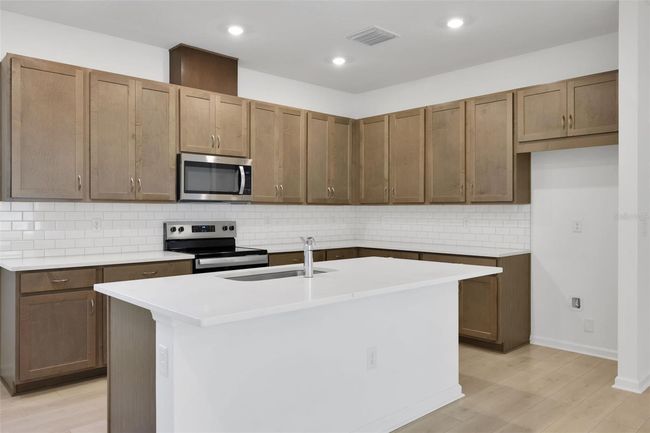 2980 Supermarine Loop, House other with 4 bedrooms, 3 bathrooms and null parking in TAVARES FL | Image 15