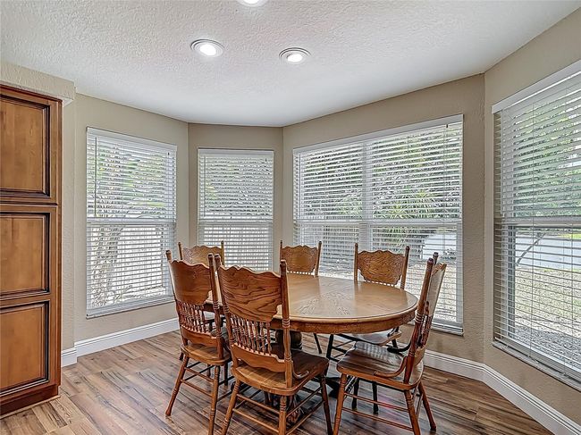 Eat-in kitchen area easily seats 6 | Image 37