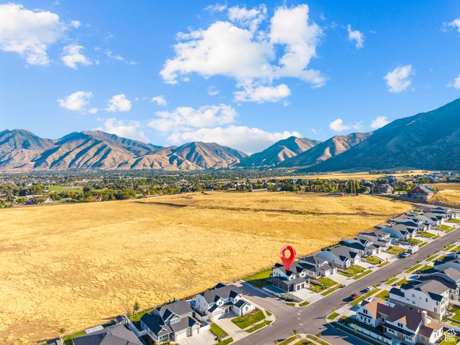 Aerial perspective of suburban area featuring a mountain backdrop | Image 63