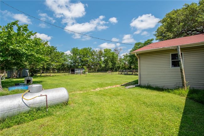 View of yard featuring an outdoor structure | Image 34