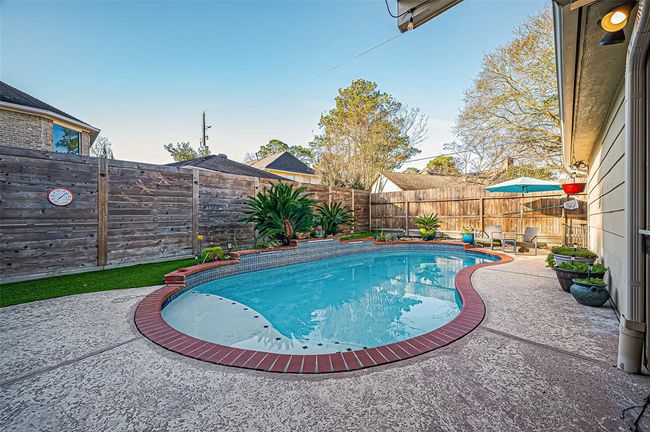 Dive into relaxation with this refreshing pool, ideal for those hot Texas summers. | Image 46