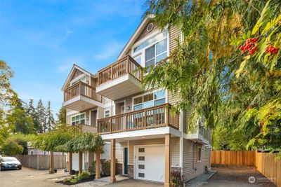 Updated Shoreline townhome with extra parking and yard. | Image 1