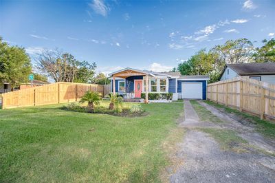 The fence has been extended on each side to provide a more private feel to the home. | Image 3