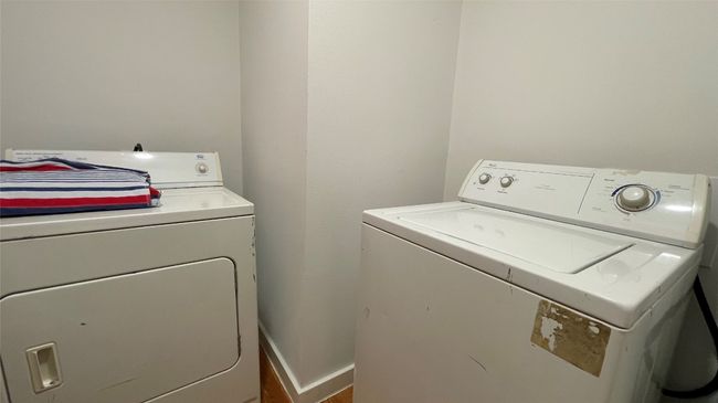 Laundry room with washing machine and dryer | Image 6