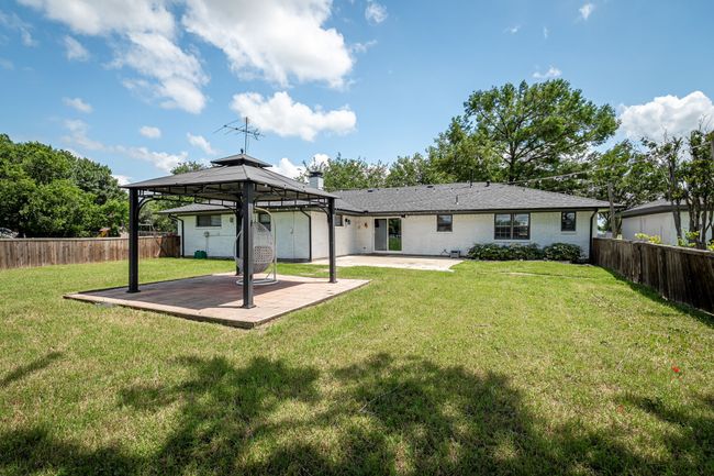 Back of house with a patio and a gazebo | Image 11