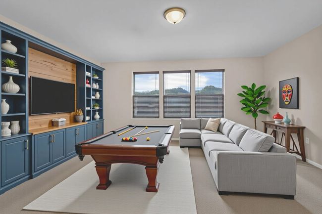 *Virtual Staged Recreation room *featuring light carpet, billiards table, and baseboards | Image 19