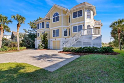 View of front of house featuring a garage and a front lawn | Image 3