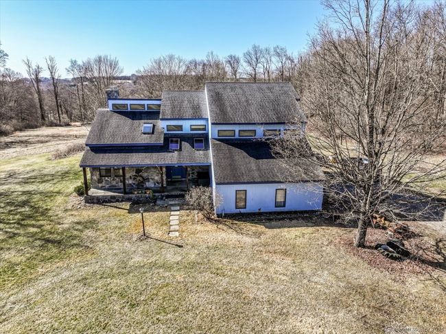 This home is surrounded by quiet fields and open space. | Image 9