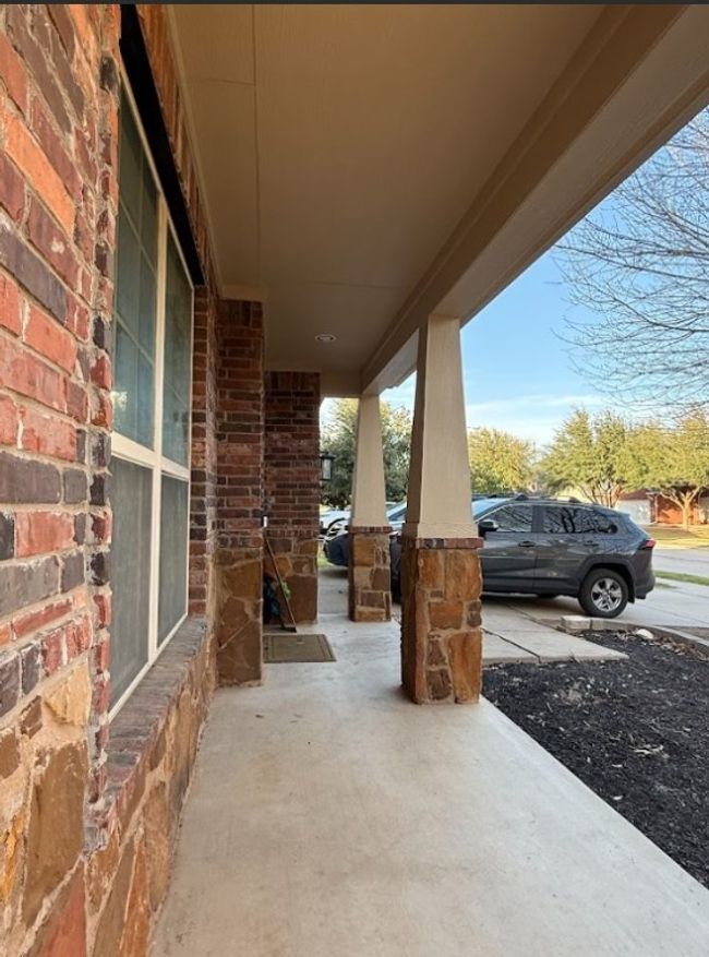 View of patio featuring a porch. | Image 11