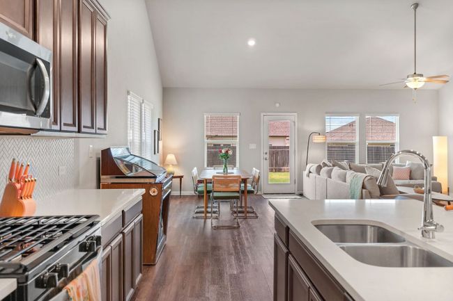 View from kitchen to open dining/living area. | Image 5