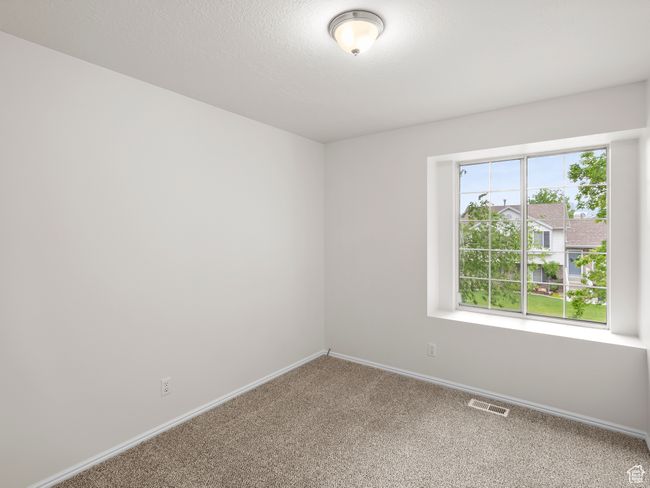 Carpeted empty room with baseboards | Image 18