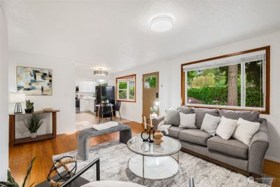 Great Room style Living Room open to beautifully updated kitchen with new cabinets with quartz countertops , appliances, and a large island for entertaining. | Image 3