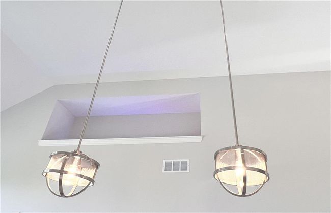 Designer-selected pendant lights over the kitchen island | Image 21