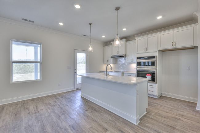 Picture is of the same floor plan in a completed home, selections may vary. | Image 10