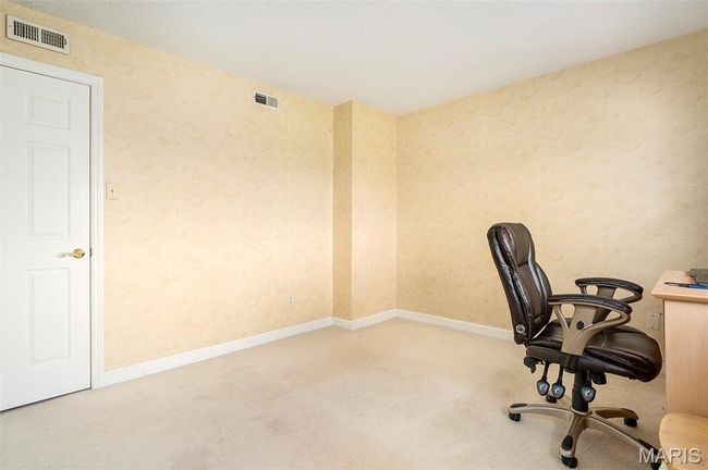 Carpeted office space featuring baseboards | Image 17