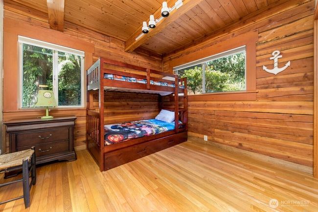 Bonus bedroom/office with closet looks out to entrance of home. | Image 12