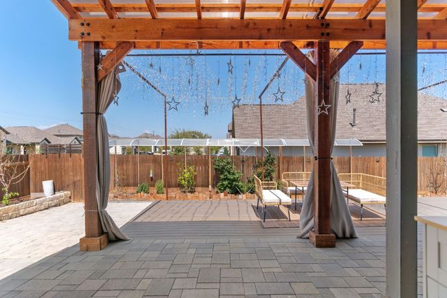 View of patio featuring a fenced backyard | Image 33