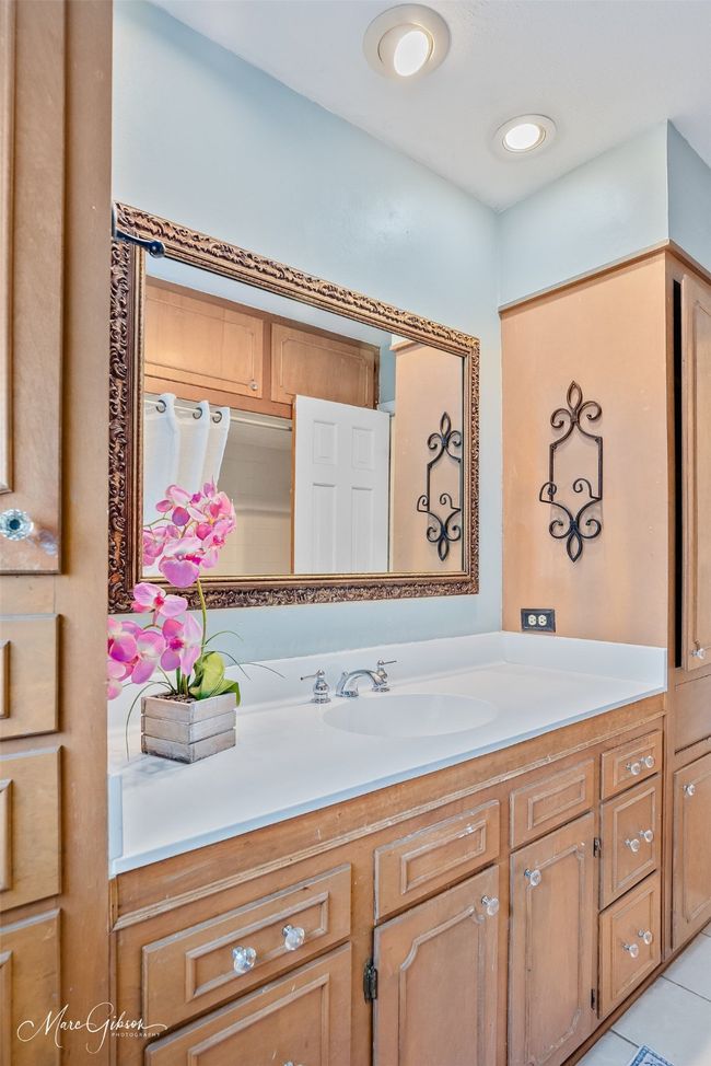 Bathroom with vanity and tile patterned floors | Image 12
