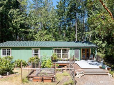 Main entry to home with enclosed garden | Image 1