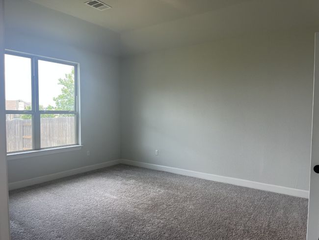 Unfurnished room with baseboards, carpet flooring, and visible vents | Image 14