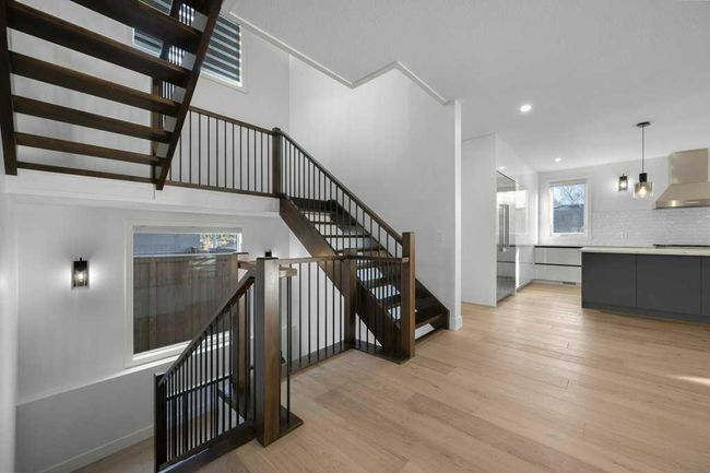 54 Malibou Road Sw, Home with 5 bedrooms, 3 bathrooms and 3 parking in Calgary AB | Image 3