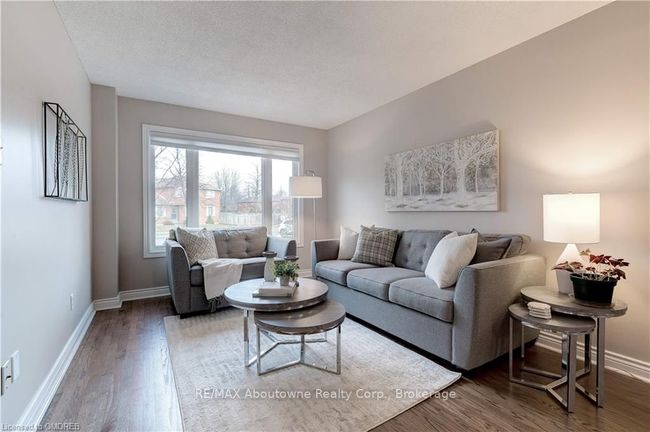 Living room with picture window | Image 4