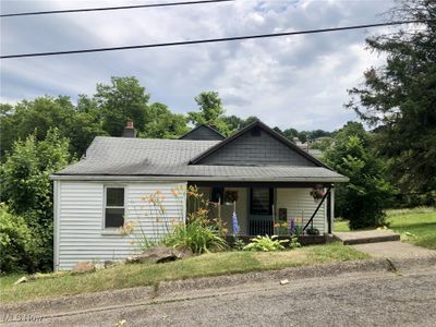 View of front of home with a porch | Image 1