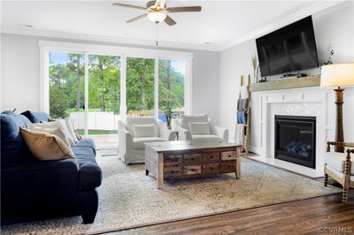 Huge windows in family room allows tons of light! | Image 3