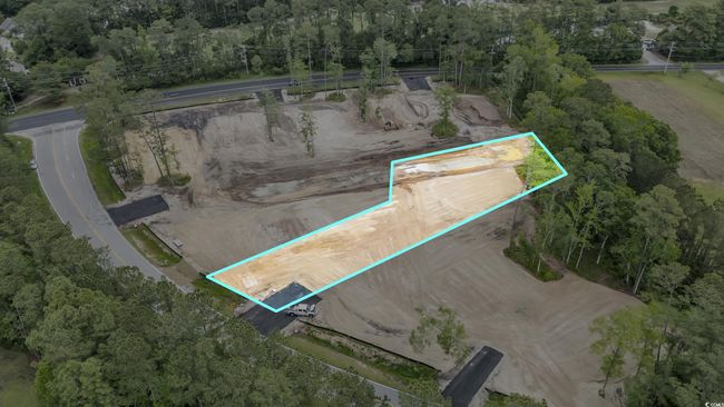 Bird's eye view featuring a wooded view | Image 4