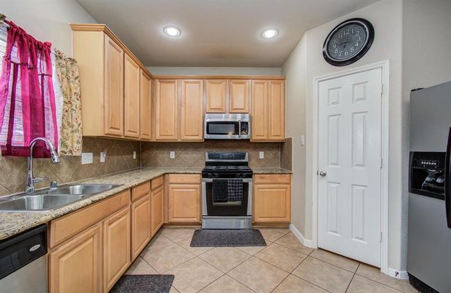 21522 Amesbury Meadow Ln, House other with 5 bedrooms, 3 bathrooms and 2 parking in Spring TX | Image 26