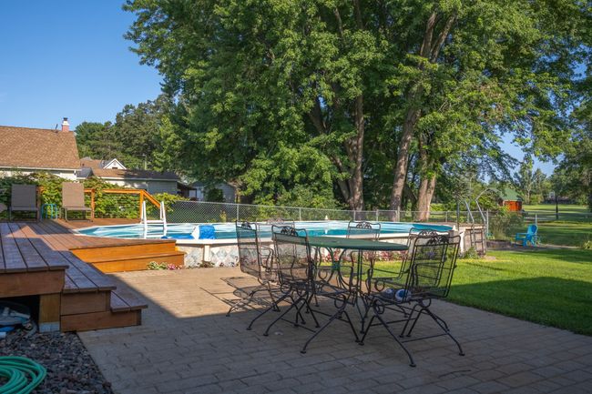 Paver patio for outdoor dining by the pool | Image 35