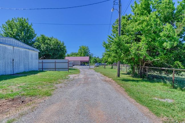 View of dirt / gravel driveway | Image 28
