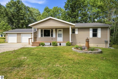 8304 W Whispering Pines Cir, Lake City, MI, 49651-9097 | Card Image