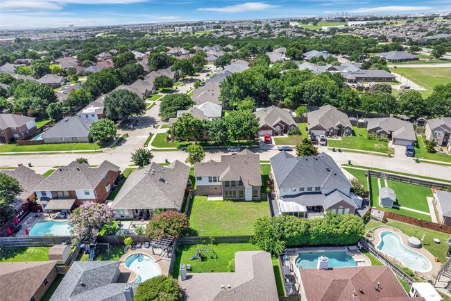 Aerial view of residential area featuring a pool | Image 38